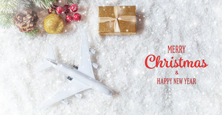 Travel for Christmas. Airplane with Christmas decor.New year.Selective focus.holidaysの写真素材