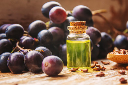 Extract of grape oil in a small jar. Selective focus. food.natureの写真素材