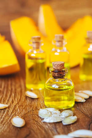 Pumpkin seed oil in a bottle. Selective focus. Nature.の写真素材