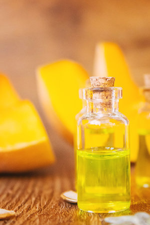 Pumpkin seed oil in a bottle. Selective focus. Nature.の写真素材