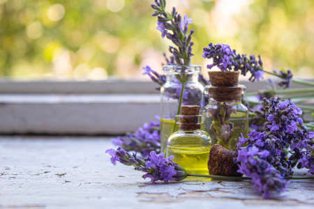 Lavender essential oil in a small bottle. Selective focus.natureの写真素材