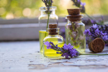 Lavender essential oil in a small bottle. Selective focus.natureの写真素材