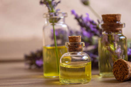 Lavender essential oil in a small bottle. Selective focus.natureの写真素材