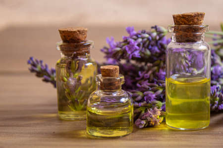 Lavender essential oil in a small bottle. Selective focus.natureの写真素材