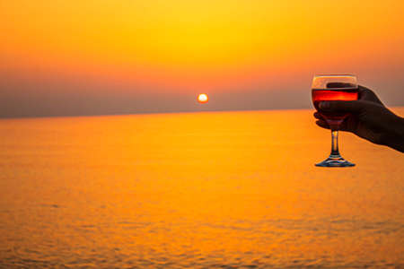 Drink wine by the sea. Selective focus. nature.の写真素材
