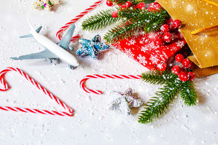 Travel for Christmas. Airplane with Christmas decor.New year.Selective focus. holidaysの写真素材