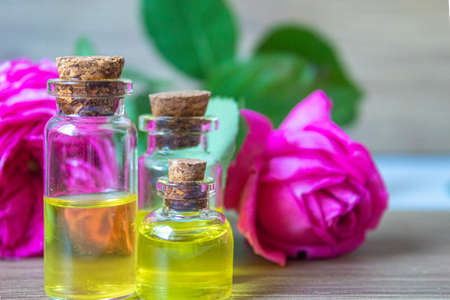 tea rose oil in a small bottle. selective focus.natureの写真素材