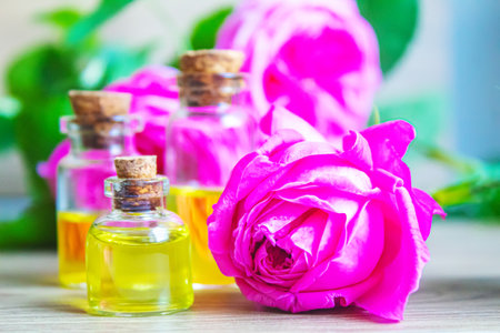 tea rose oil in a small bottle. selective focus.natureの写真素材