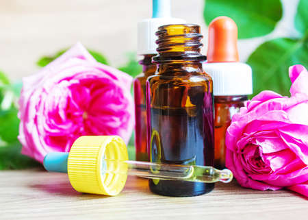 tea rose oil in a small bottle. selective focus.natureの写真素材