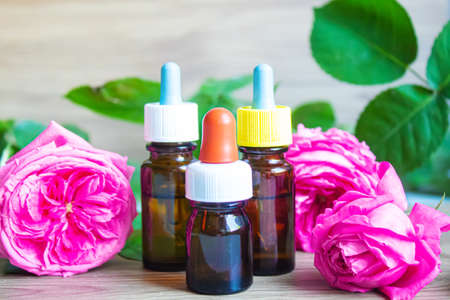 tea rose oil in a small bottle. selective focus.natureの写真素材