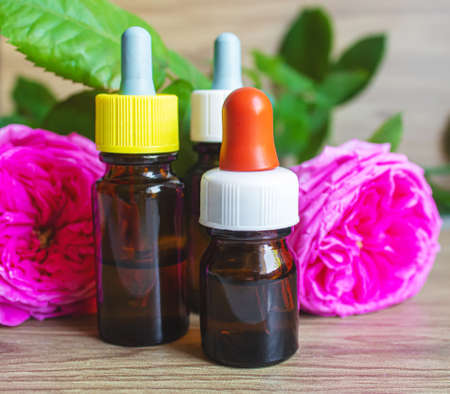 tea rose oil in a small bottle. selective focus.natureの写真素材
