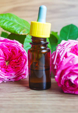 tea rose oil in a small bottle. selective focus.natureの写真素材