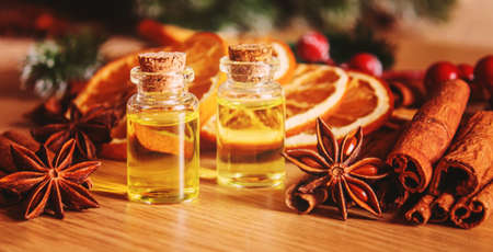 Christmas essential oils in a small bottle. Selective focus. Holiday.の写真素材