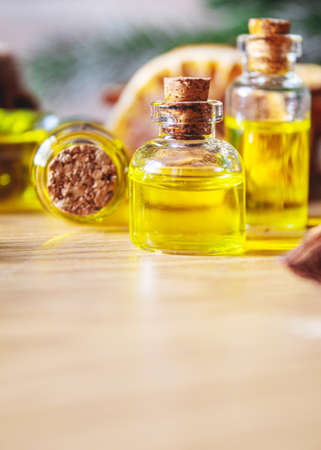 Christmas essential oils in a small bottle. Selective focus. Holiday.の写真素材