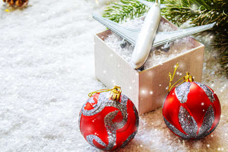 Travel for Christmas. Airplane with Christmas decor.New year.Selective focus.holidaysの写真素材