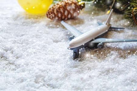 Travel for Christmas. Airplane with Christmas decor.New year.Selective focus.holidaysの写真素材
