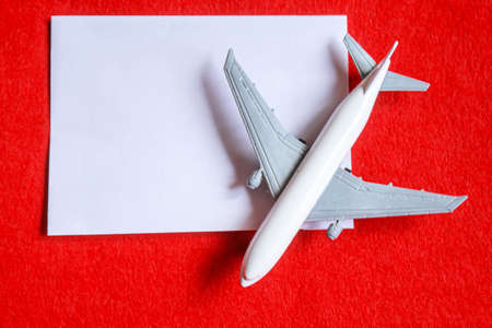 Hearts and a plane on a red background. Valentines Day. Selective focus.の写真素材