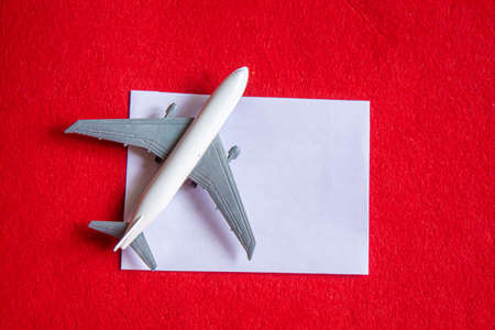 Hearts and a plane on a red background. Valentines Day. Selective focus.の写真素材