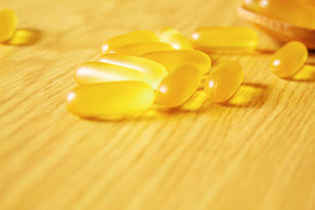 omega 3 gel capsules.healthy vitamins.selective focus. food