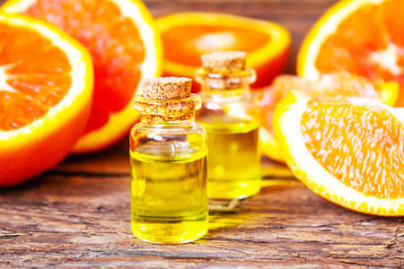 Grapefruit essential oil in a small bottle. selective focus. food.の写真素材
