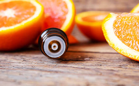 Grapefruit essential oil in a small bottle. selective focus. food.の写真素材