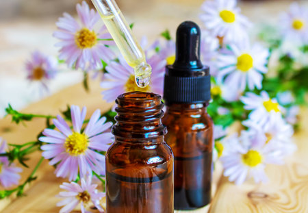 flower oil in glass bottles.homeopathy.selective focusの写真素材