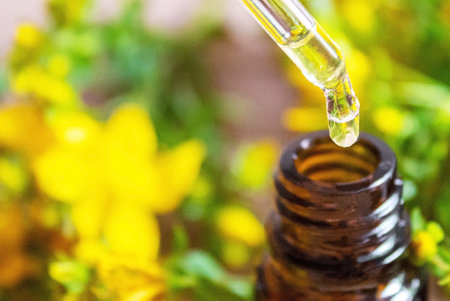 extract St. John's wort in a small jar. Selective focus.natureの写真素材