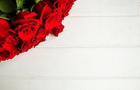 red rose on a wooden background. Valentine's Day gift.selective focus.holidayの写真素材