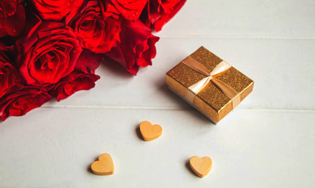 red rose on a wooden background. Valentine's Day gift.selective focus.holidayの写真素材