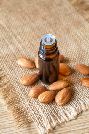 Almond essential oil in a small bottle. selective focus foodの写真素材