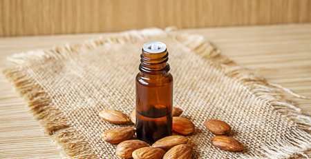 Almond essential oil in a small bottle. selective focus foodの写真素材