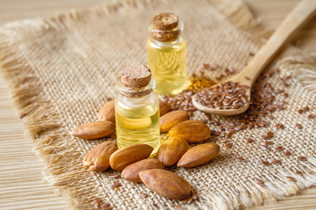Almond essential oil in a small bottle. selective focus foodの写真素材