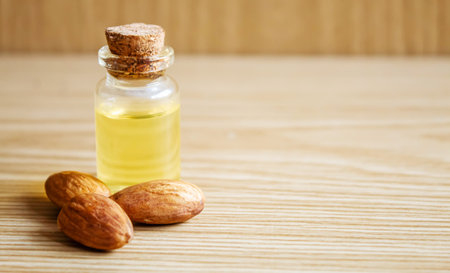 Almond essential oil in a small bottle. selective focus foodの写真素材
