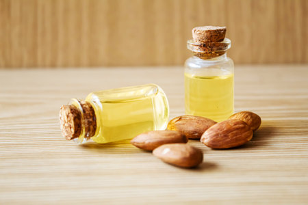 Almond essential oil in a small bottle. selective focus foodの写真素材