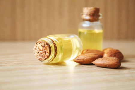 Almond essential oil in a small bottle. selective focus foodの写真素材