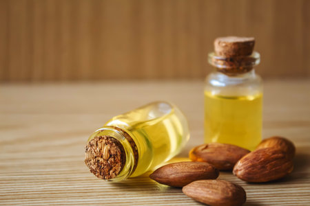 Almond essential oil in a small bottle. selective focus foodの写真素材