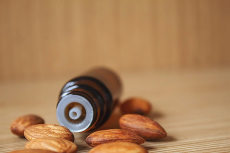 Almond essential oil in a small bottle. selective focus foodの写真素材