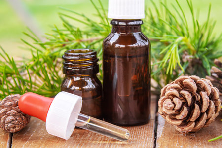 Fir tree essential oil in small bottles. Selective focus.natureの写真素材