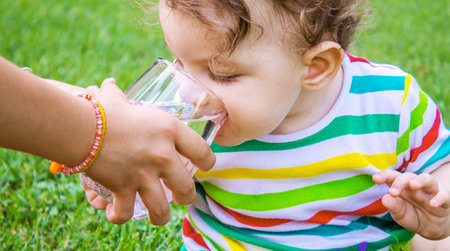 child glass of water. food selective focus. Childrenの写真素材