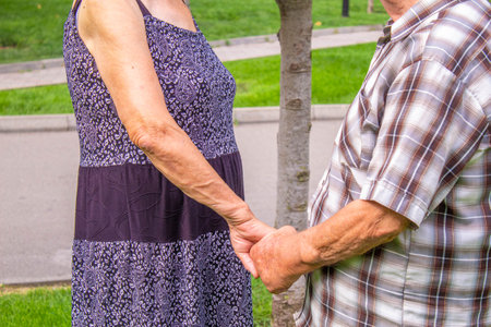grandparents holding hands. people selections focusの写真素材