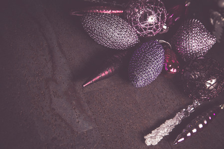 vintage christmas 2019 background with colorful toys on dark surfaceの写真素材