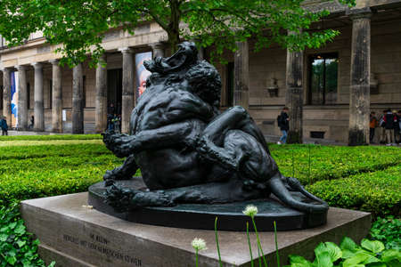 13 May 2019 Berlin, Germany - The Sculpture of Hercules and the Nemean Lion by Max Klein inside of the Colonnade Park of the Museum Island in Berlin, Germanyのeditorial素材