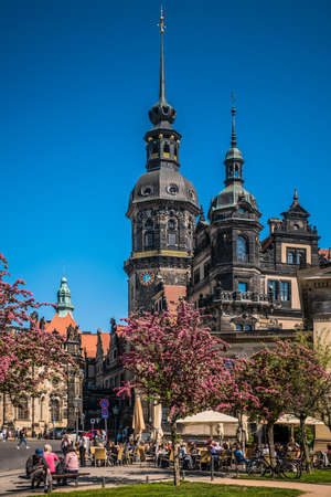 17 May 2019 Dresden, Germany - the Dresden castle on a sunny day in blooming treesのeditorial素材