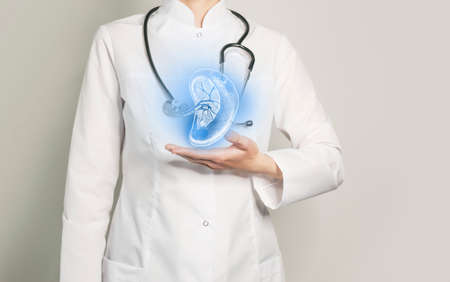 Spleen issues medical concept. Photo of female doctor, empty space.の写真素材