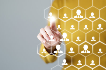 Human resources manager pointing at virtual network chain with person icons. Human capital and teambuilding concept.の写真素材