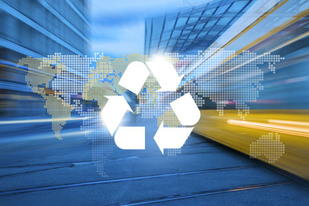 Big city road and tram way, recycle symbol and planet continents on bokeh background. Clean future and recycle concept.の写真素材