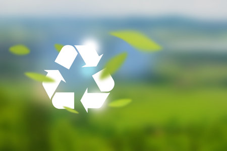 White icon representing the ecological call to recycle and reuse package on bokeh background of green fresh nature. Clean future and recycle concept.の写真素材