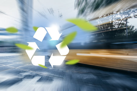 Big city road and tram way, recycle symbol on bokeh background. Clean future and recycle concept.の写真素材