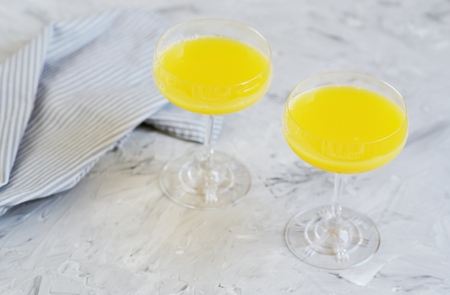 Fresh Orange Juice in the Glass Summer Morning Drink Beverage Gray Background Vitaminsの写真素材