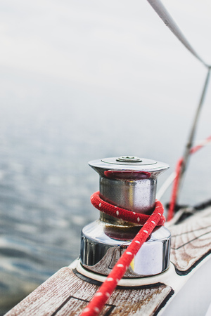 Sailboat Winch and Rope Yacht Details. Yachting Sunsetの写真素材